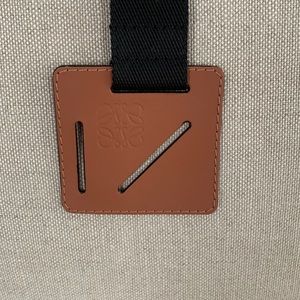 Loewe trunk strap with leather branded stamped logo